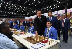 The President of Azerbaijan Ilham Aliyev makes the first move at the Baku Olympiad in the game Shaharyar Mamedyarov versus Rodwell Makoto.