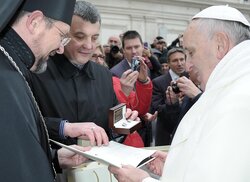 Handing of cufflinks to Pope Francis by Igor Lobortas