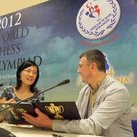 Hou Yifan, Chinese chess player, the holder of three world champion titles among women, the winner of three women's world team chess championships in the linup of PRС national team, and Igor Lobortas.