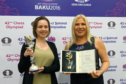 Official awarding of Maria Muzychuk, the best female chess player of 2015, with the Caissa Women's Chess Oscar by Susan Polgar, chairwoman of the FIDE Women's Chess Committee.
